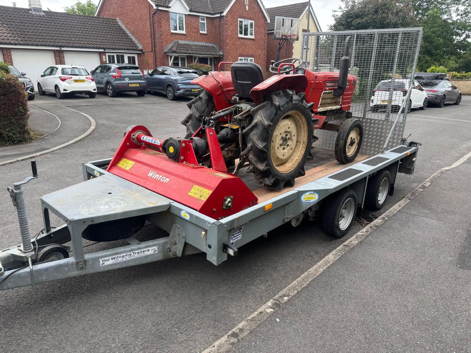Tractor and flail mower loaded and ready